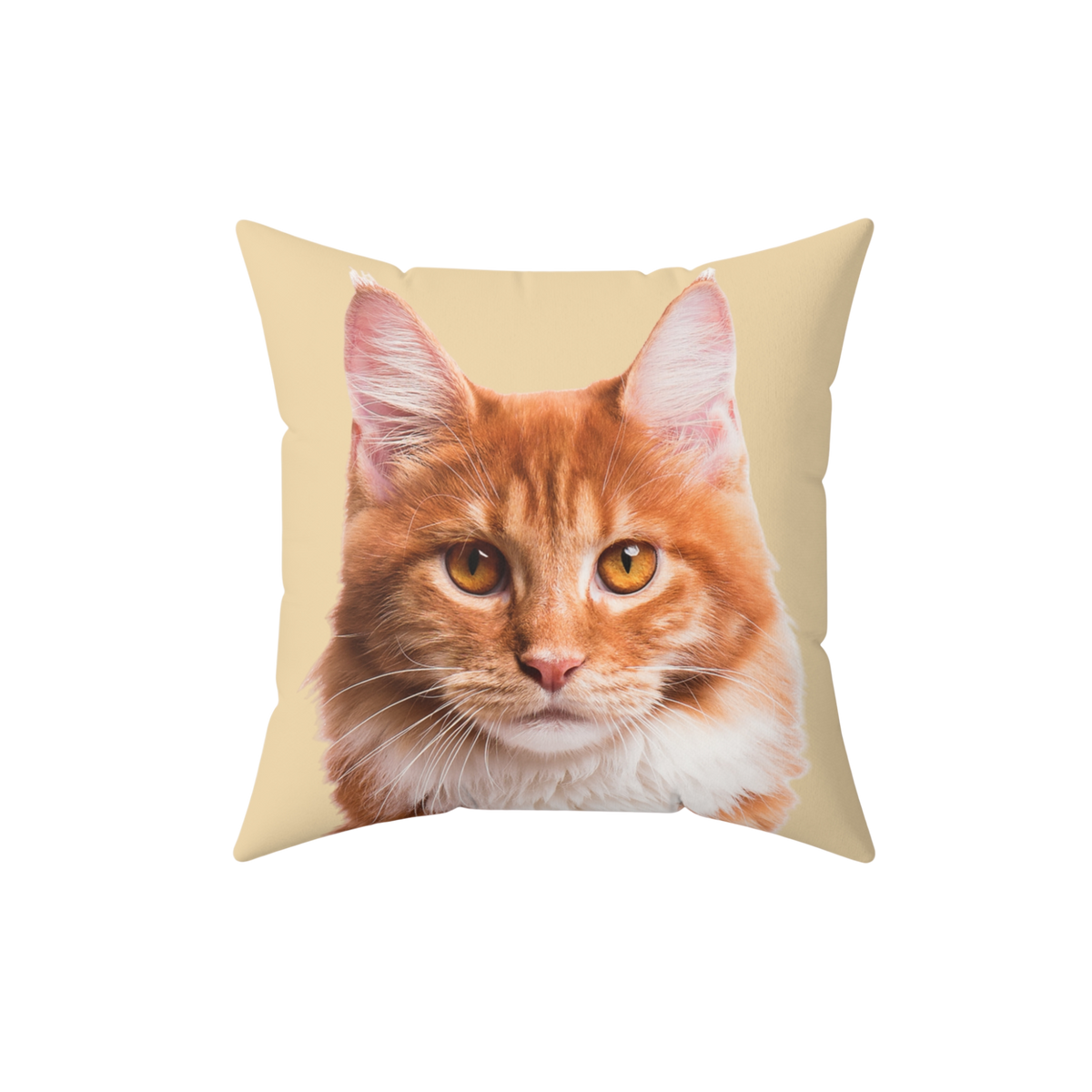 Yellow pillow with the face of a cat