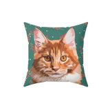 Green pillow with a pattern of berries and the illustration of a cat