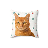 Custom 16 inch throw pillow with an orange tabby cat photo cutout portrait on a white background with red and green paw prints[ChristmasPawsImageCutOut]