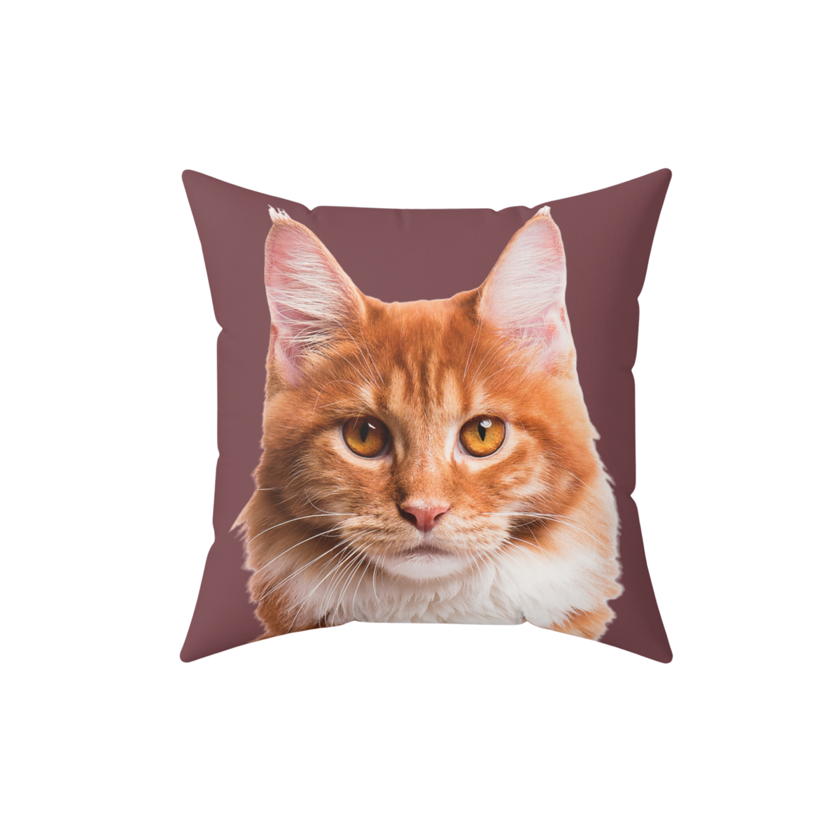 Maroon pillow with the face of a cat