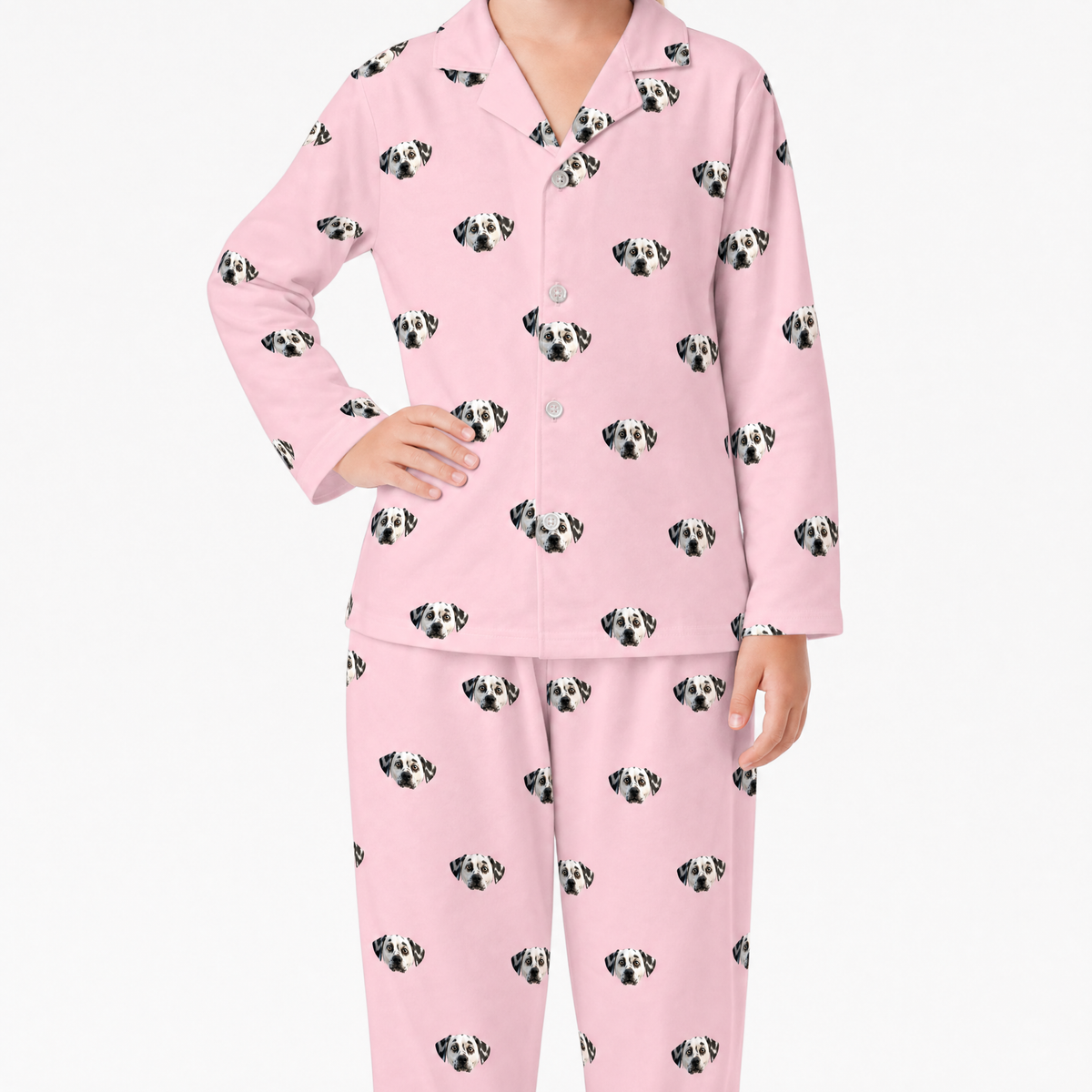 Pink pajama set with dog pattern on a white background