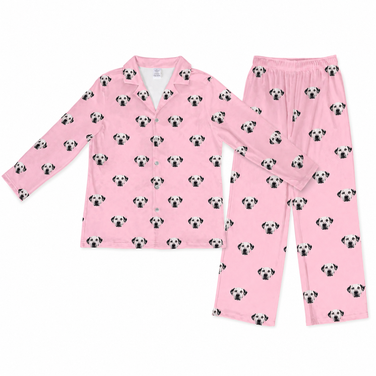 Pink pajama set with dog pattern on a white background