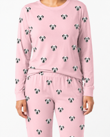 Pink jogger pajama set with dalmatian dog pattern on a white background