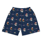 A pair of navy blue boxer shorts featuring a repeating Christmas-themed pattern with dog portraits wearing red Santa hats, green wreaths, snowflakes, and the text 'CANDY CANE WEEK'.