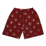 Red boxer shorts with an all-over repeating print of a black and white dog's face surrounded by ornate floral and decorative motifs, shown on a plain white background.