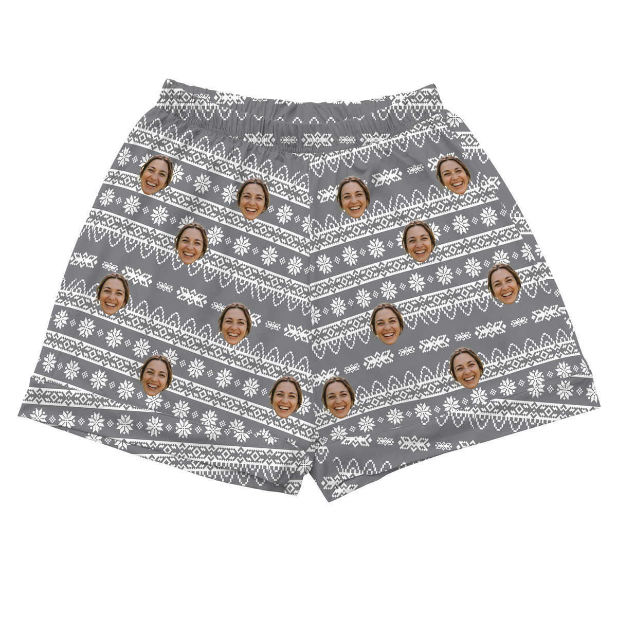 Gray elastic-waist shorts patterned with a white Fair Isle or ugly holiday sweater knit design, overlaid with a repeating pattern of a smiling woman's face.