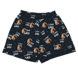 Black pajama short with 'I love Dad' text and child's face pattern on a black background[ILoveDadPajamaShorts]