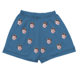 Blue pajama shorts with elastic waist, featuring evenly spaced prints of a smiling kid’s face[SolidBluePajamaShorts]