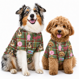 Two dogs wearing matching dog shirts with a green plaid pattern, printed dog faces, pink dog silhouettes, and the word 'Corgi' on a white background.