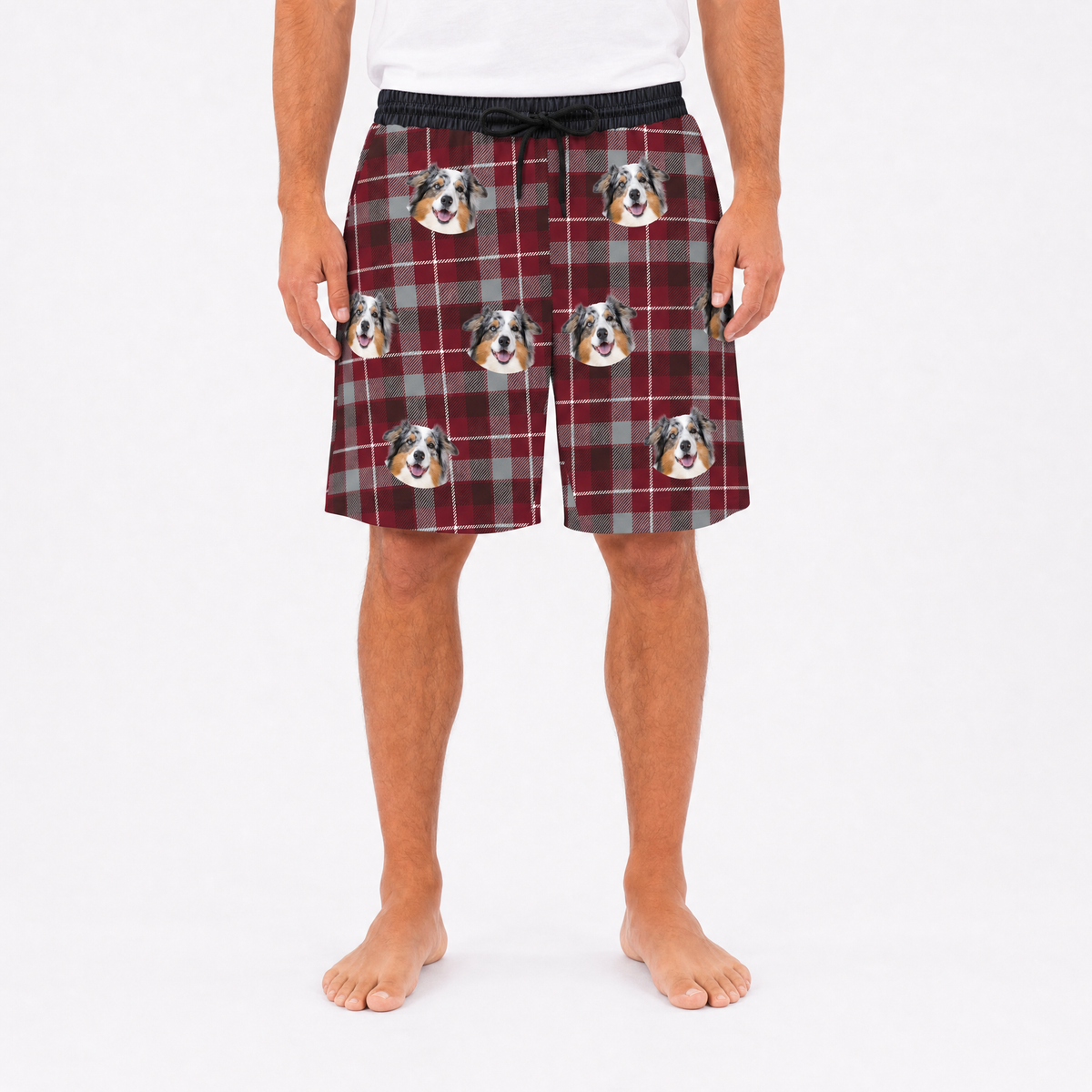 Plaid shorts with dog faces on a white background