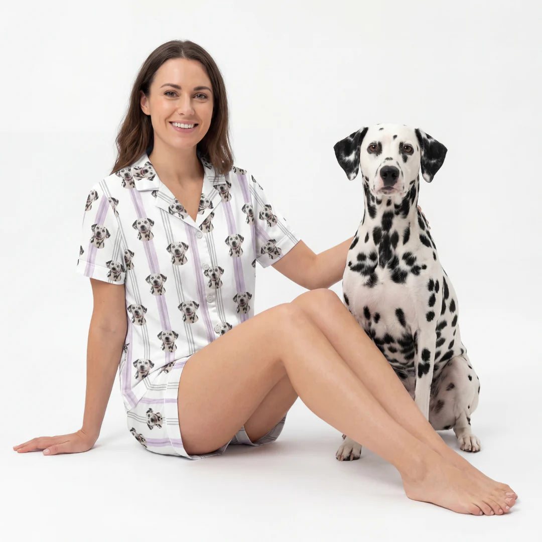 Woman wearing a pajama set with a Dalmatian dog on a white background