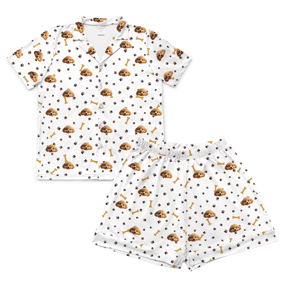 Children's pajama shirt and short set with cartoon dog paws and bones pattern on a white background[PawsandBonesShortSleevePajamaShirt&ShortsSet]