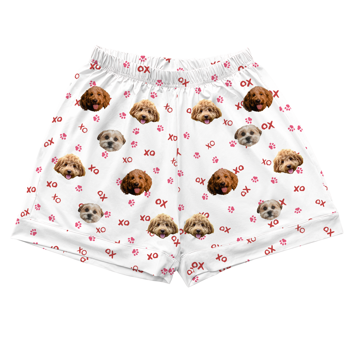 White shorts with dog pattern and red designs on a white background