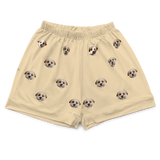 These are pajama shorts in a butter yellow color with repeating pet faces on them[ButterYellowPajamaShorts]