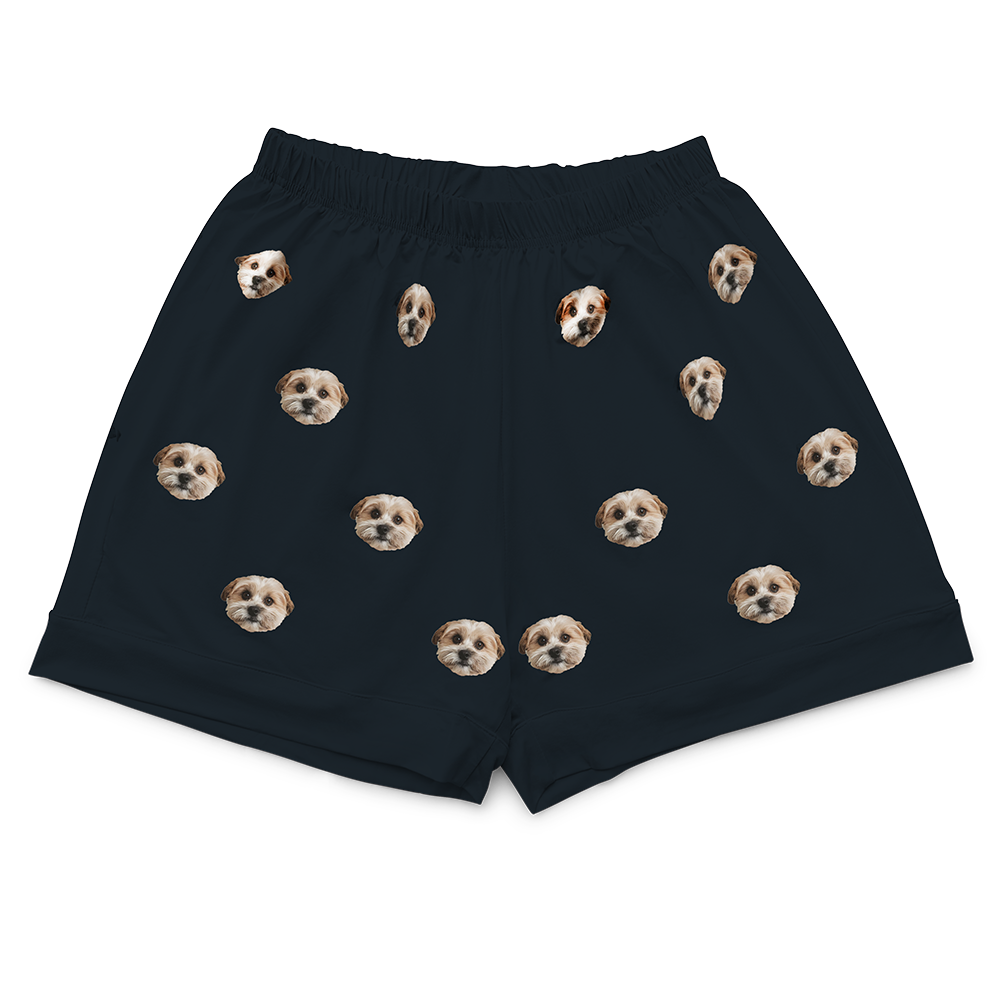 These are pajama shorts in a black color with repeating pet faces on them[PajamaShorts]