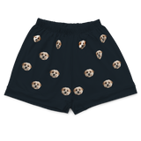 These are pajama shorts in a black color with repeating pet faces on them[BlackPajamaShorts]