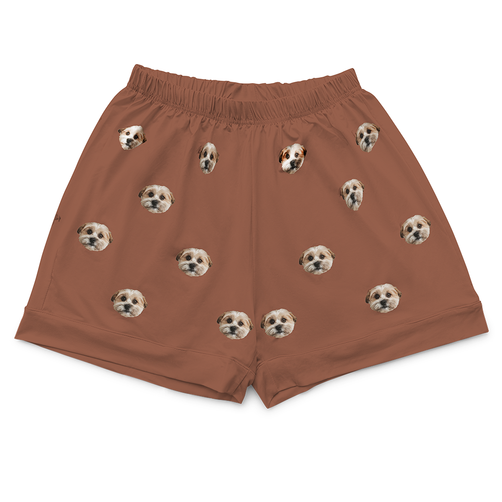 These are pajama shorts in a brown color with repeating pet faces on them[PajamaShorts]