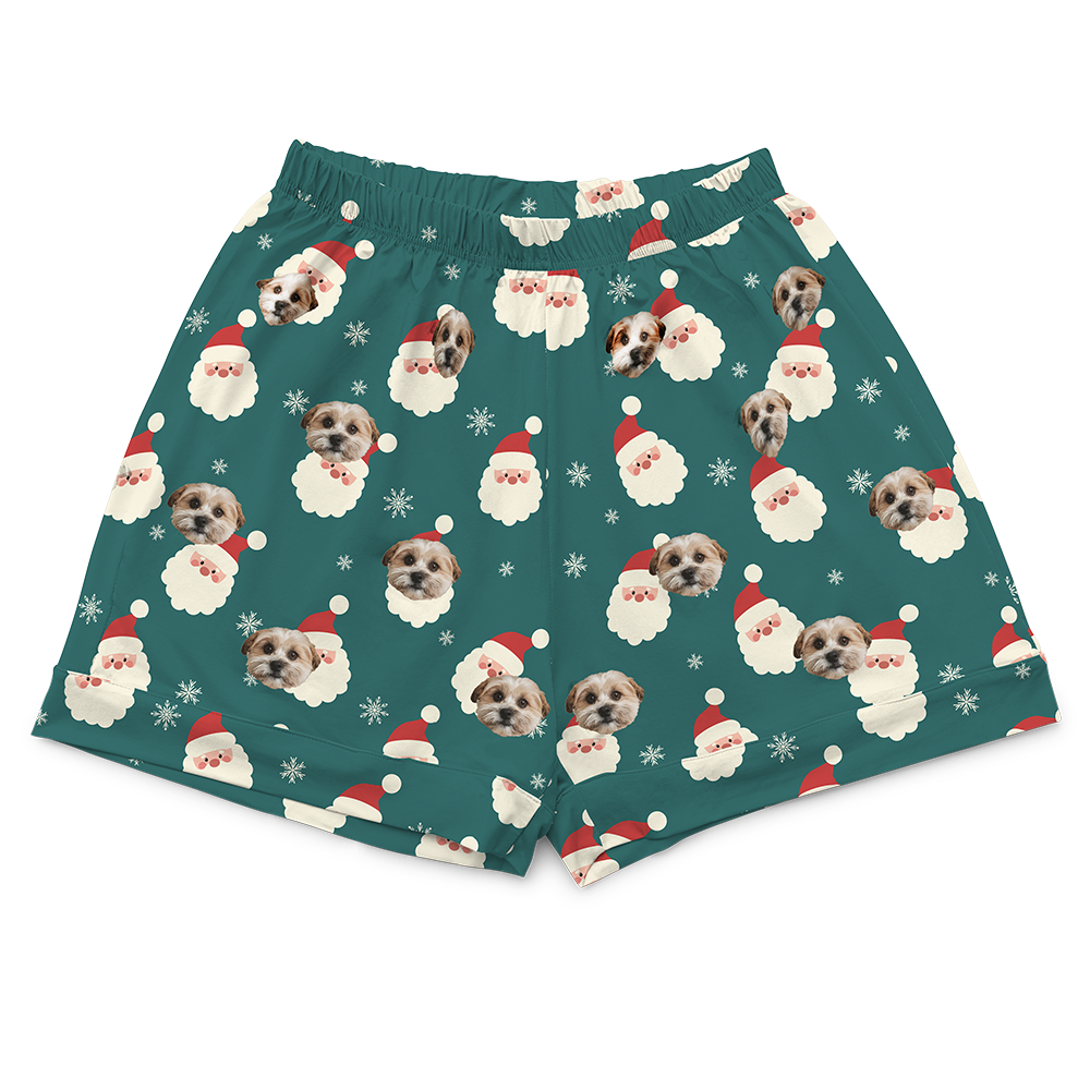 Shorts with Santa Claus and dog pattern on a green background
