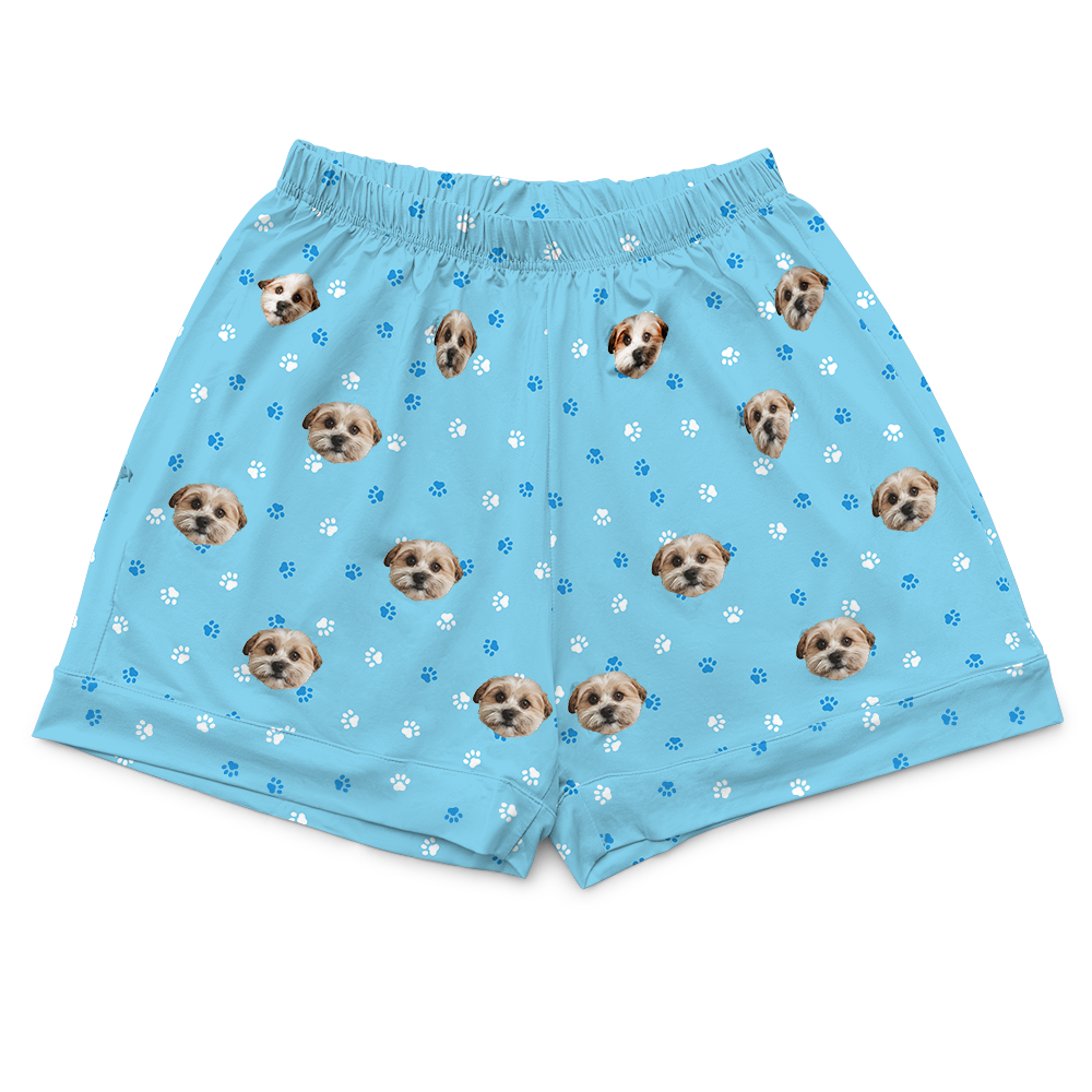 These are pajama shorts in a blue color with repeating pet faces on them[PajamaShorts($45.00)]