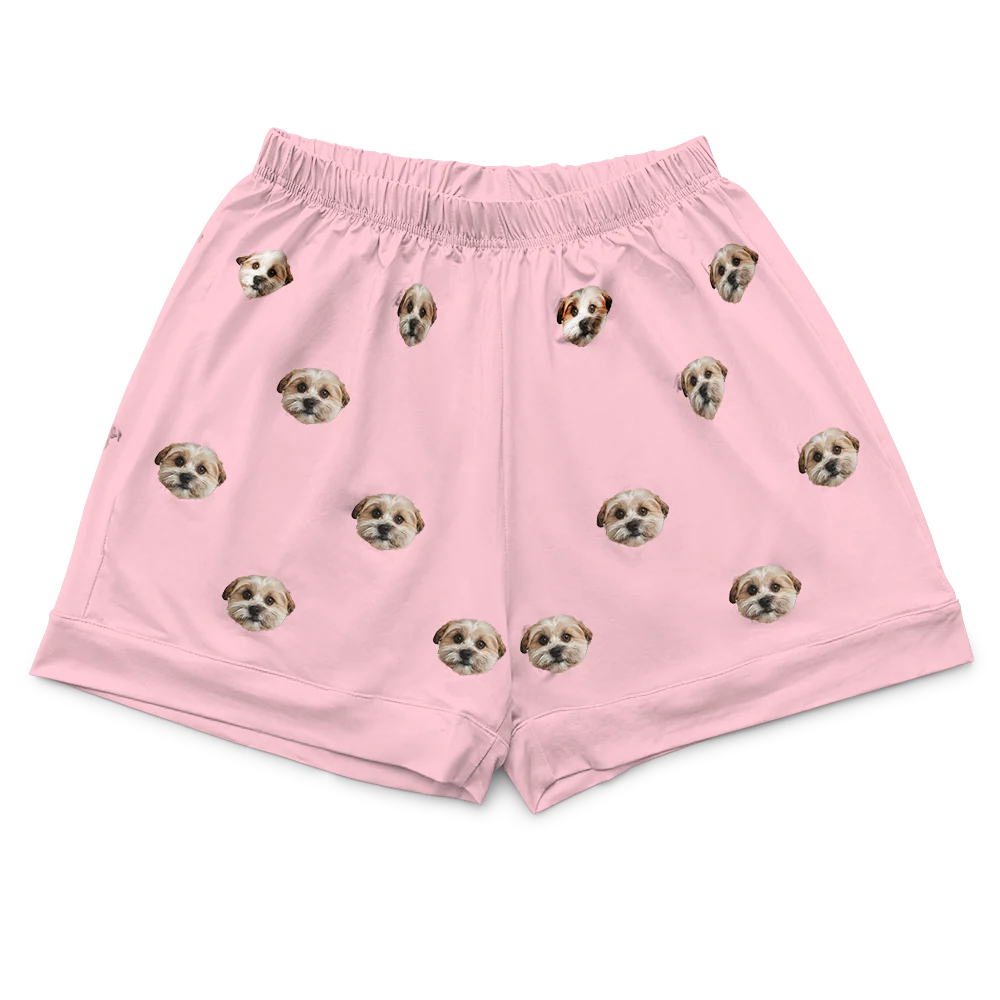 These are pajama shorts in a pink color with repeating pet faces on them[PajamaShorts($45.00)]