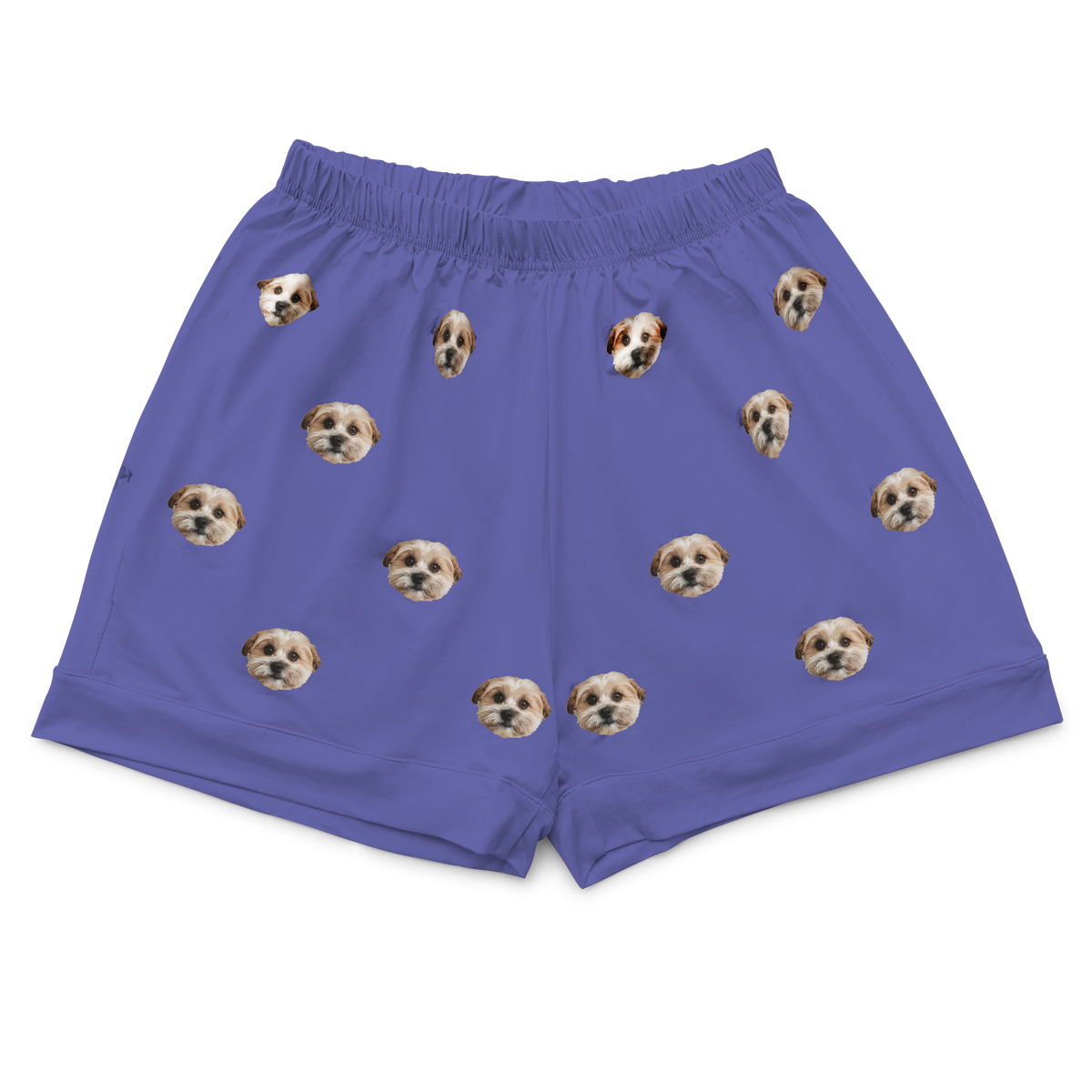 A pair of grape-colored pajama shorts with an elastic waistband. They feature an all-over repeating pattern of a single small, fluffy dog's face, scattered across the fabric.