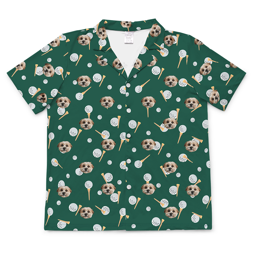 Green shirt with dog and golf balls pattern on a white background