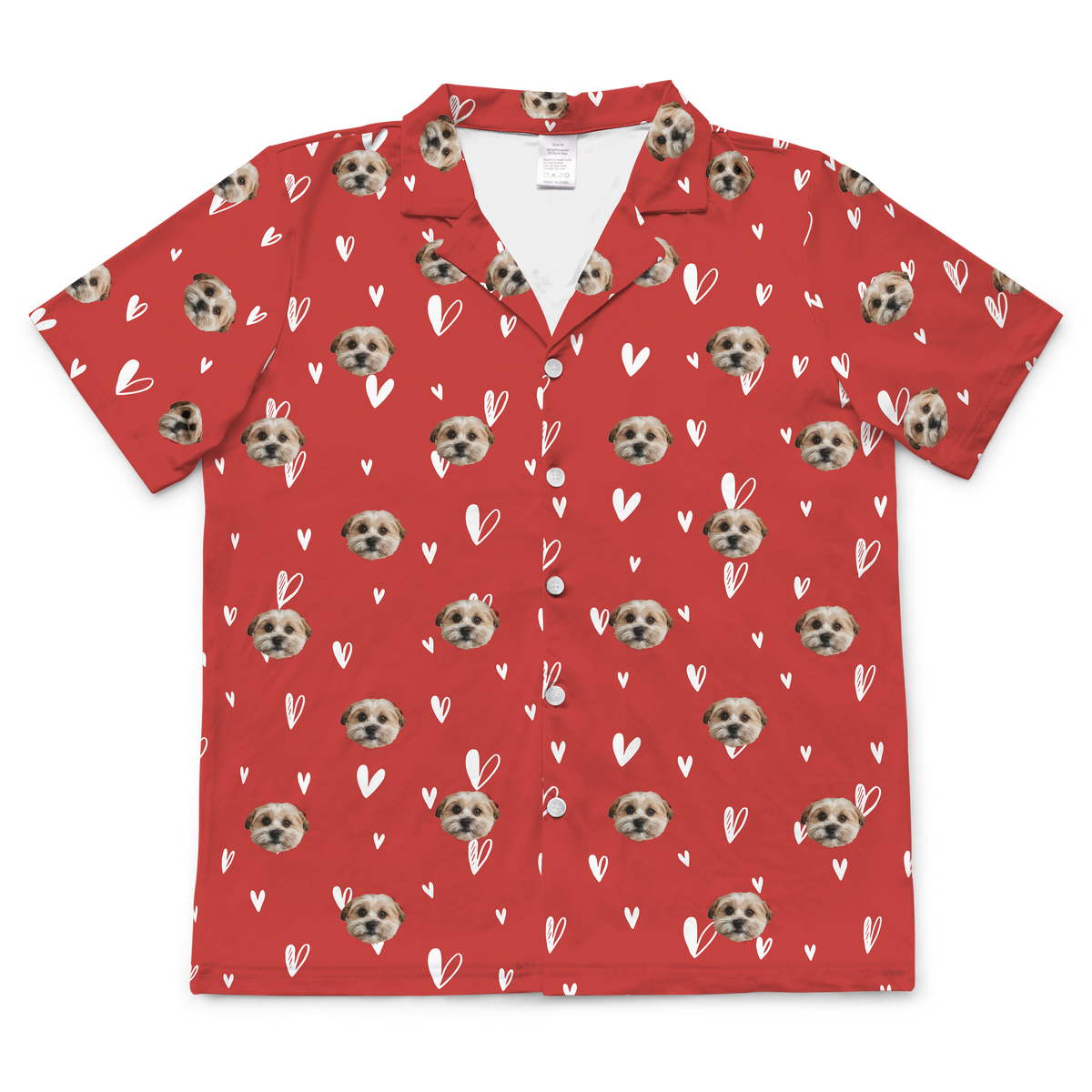 Red short-sleeve pajama top (button-down shirt) with a repeating pattern of white hearts and the custom face of one light-colored dog.