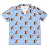 Blue button-up shirt with white snowflakes and repeating expressive faces[SnowflakesShortSleevePajamaShirt]