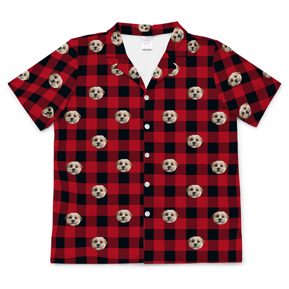 Red and black checkered shirt with dog pattern on a white background