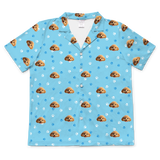 Children's pajama short sleeve shirt with cartoon dog pattern on a light blue paws background[LightBluePawsShortSleevePajamaShirt]