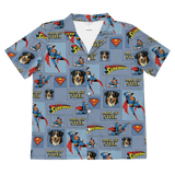 Superman-themed shirt with dog images on a blue background