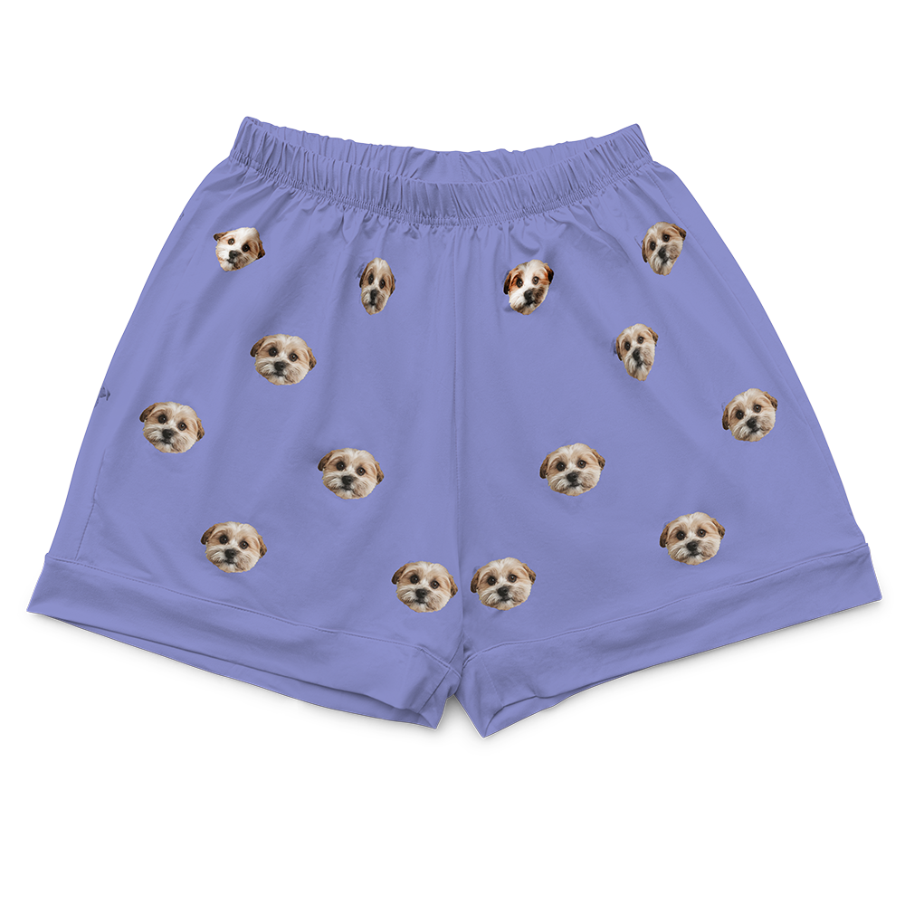 Personalized elastic-waist pajama shorts in a periwinkle color, featuring a repeating pattern of the face of a single, small tan and white dog.