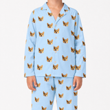 Sky blue pajama set with corgi pattern on a white background