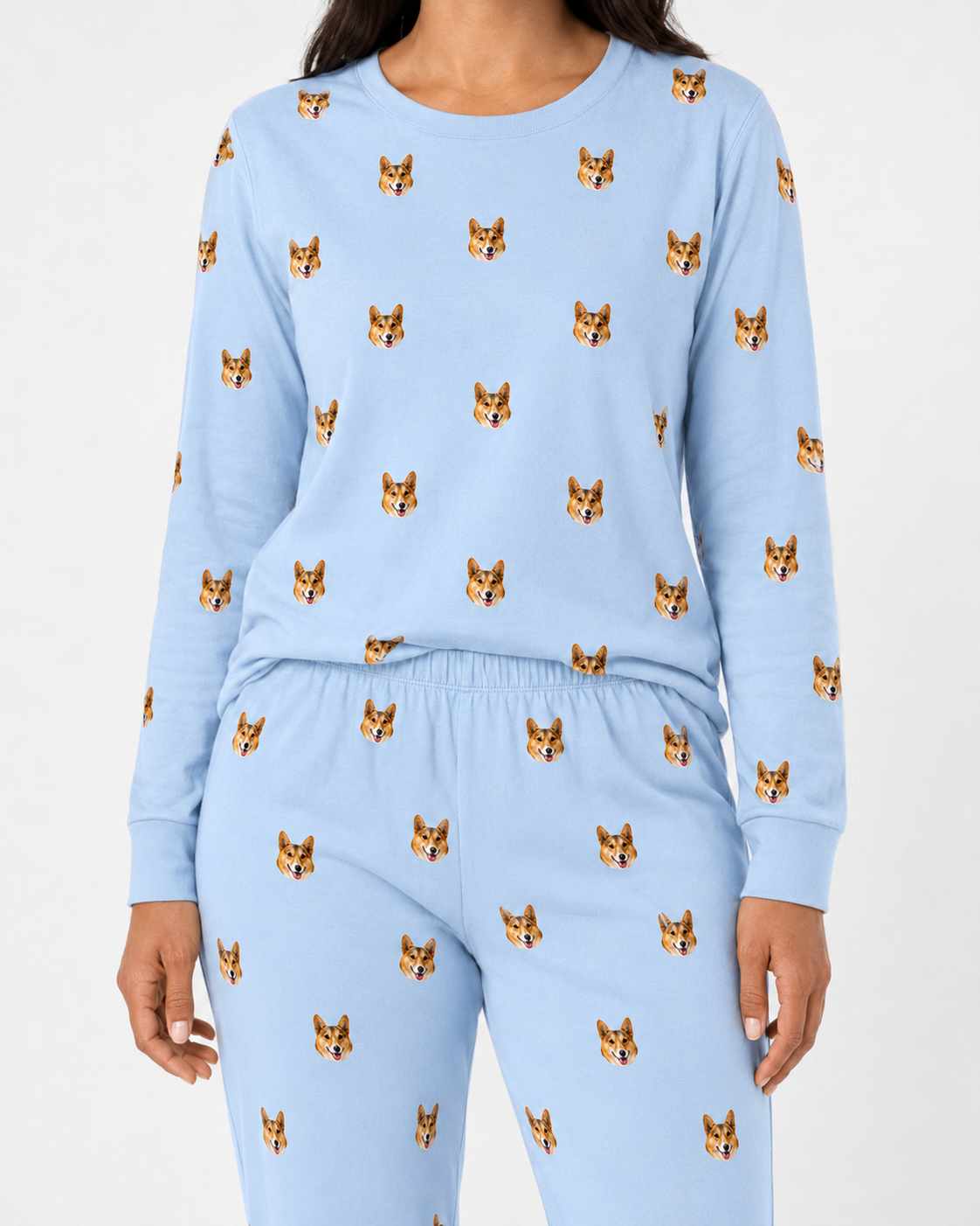Light blue jogger pajama set with dog pattern on a plain background