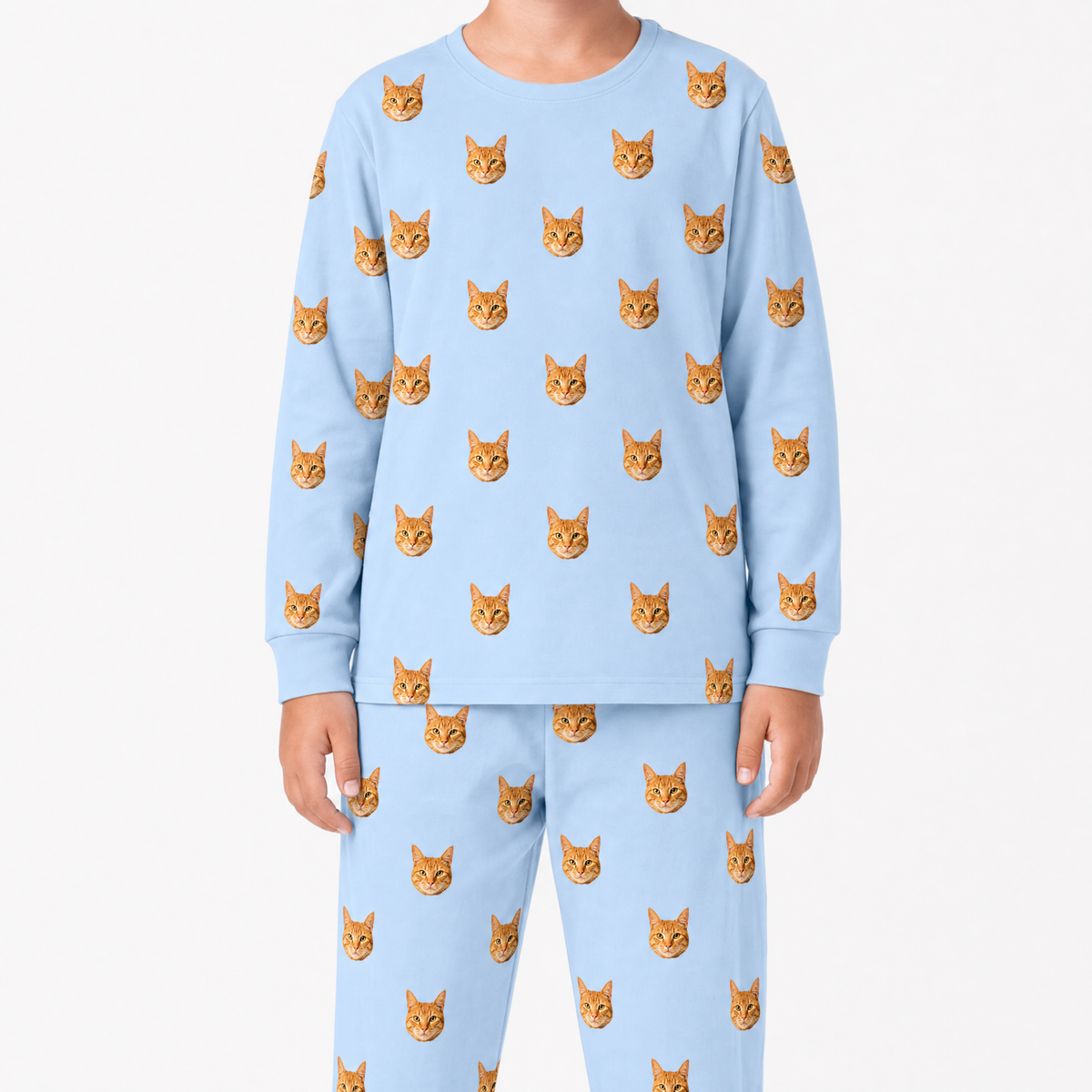 Sky blue jogger pajama set with orange cat faces on a white background