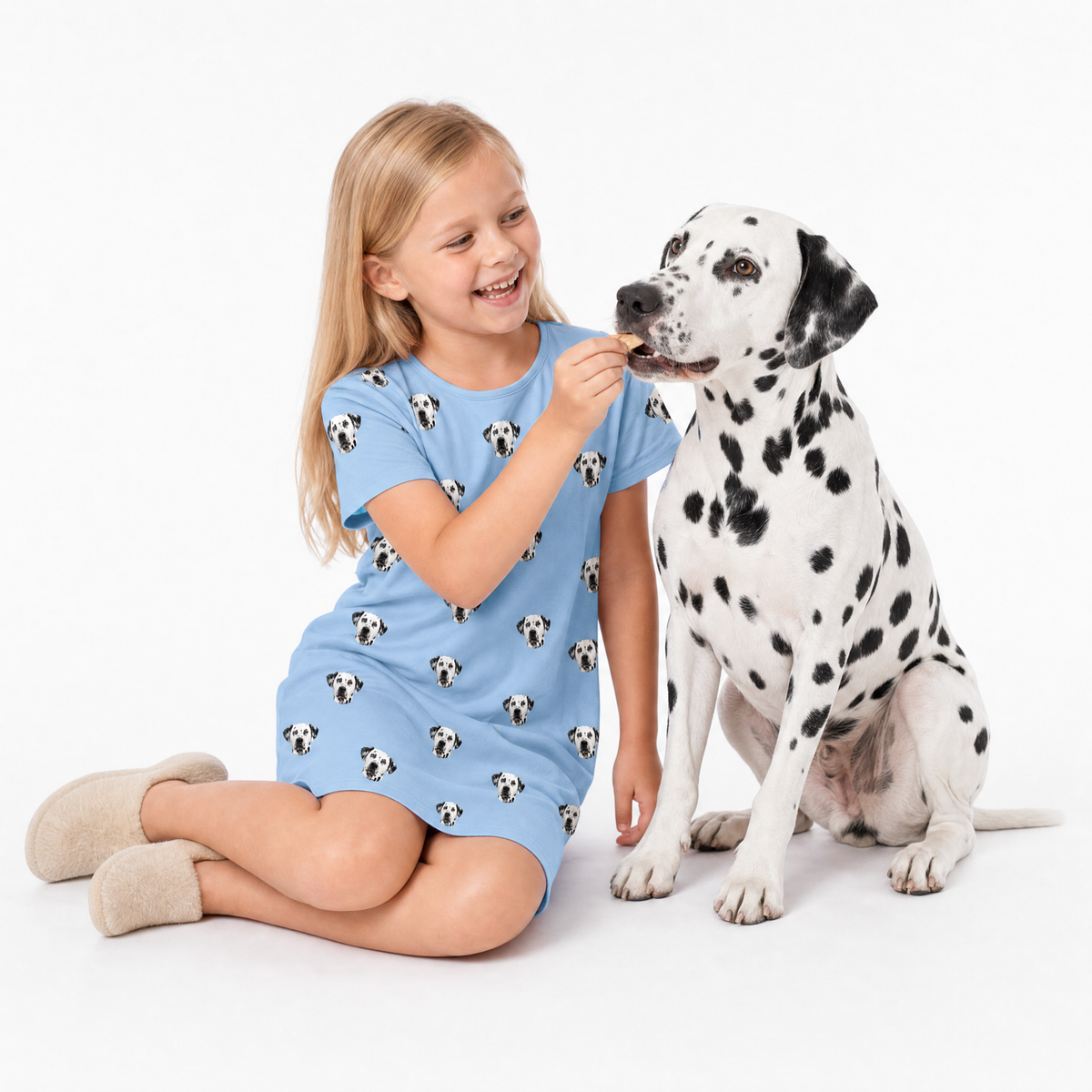 Sky blue kids fleece blanket hoodie theme – child in Dalmatian‑print dress feeding Dalmatian dog.