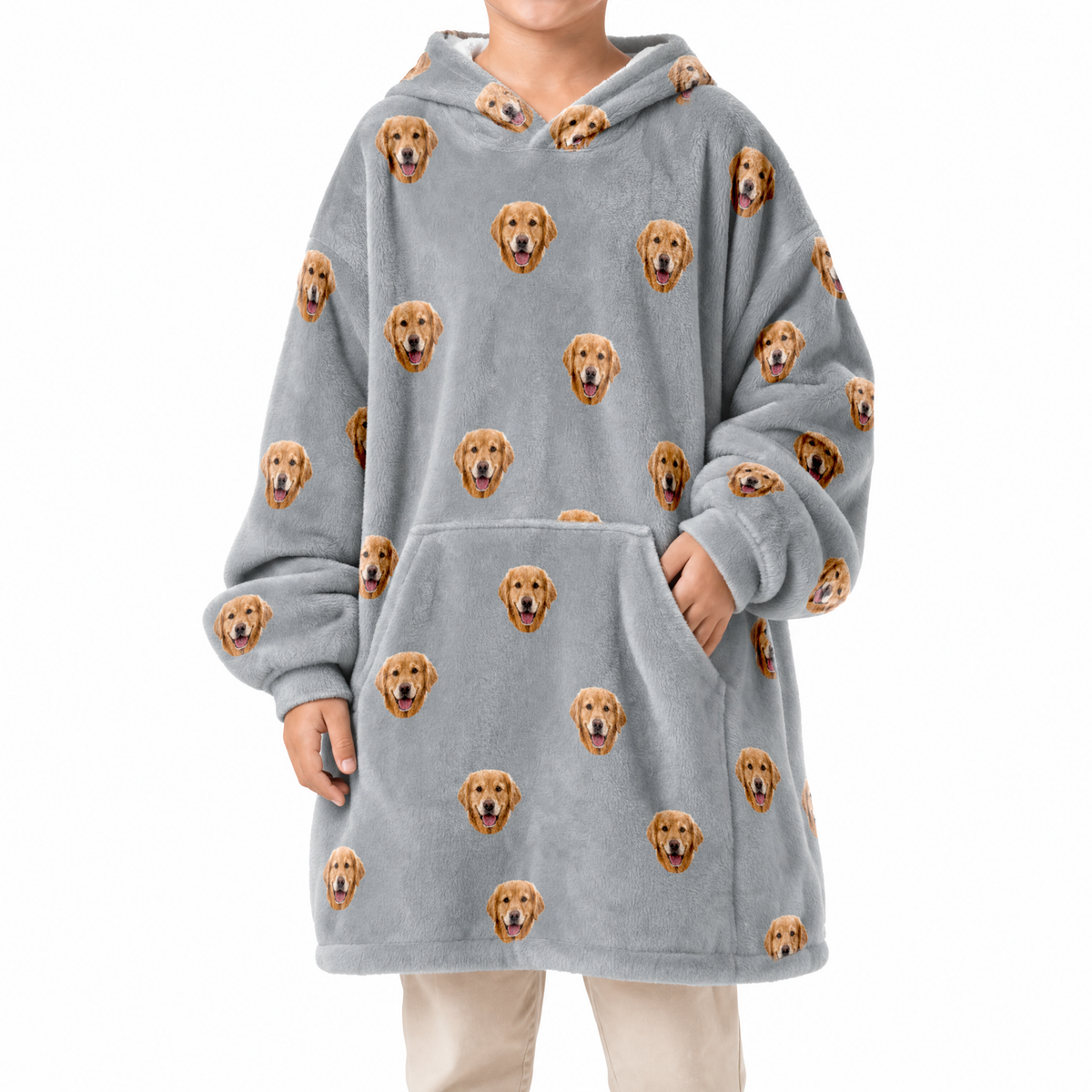 Gray blanket hoodie with dog pattern worn by a person on a white background