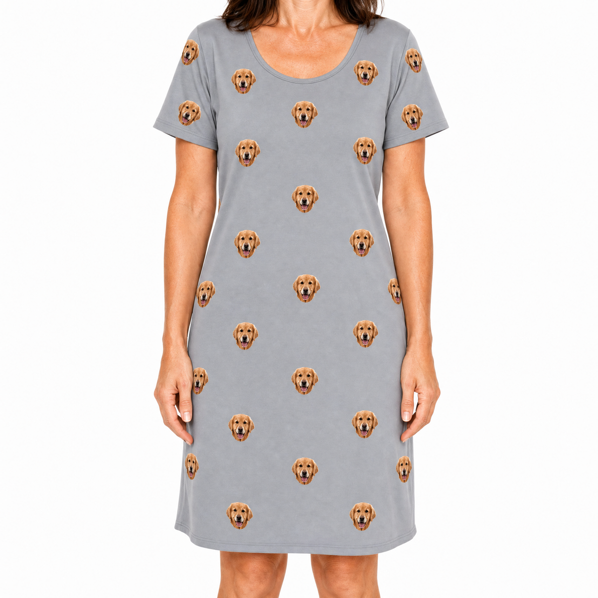 Gray nightgown with dog face pattern worn by a person on a white background
