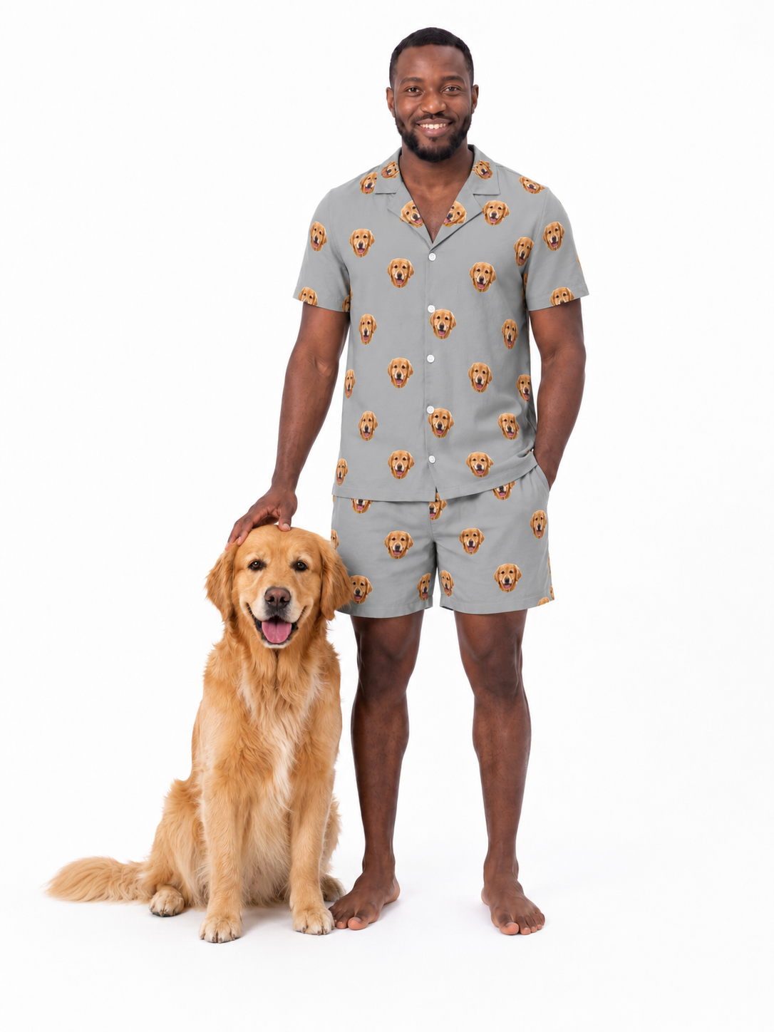 Man wearing a patterned pajama set with a dog on a white background