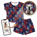 Fitted t-shirt and shorts set with superhero and dog pattern, including a phone with a dog photo and a circular dog portrait.