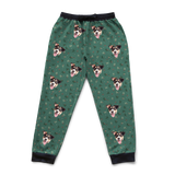 These are sweatpants in a Mistletoe print with repeating pet faces on them[MistletoeSweatpants]