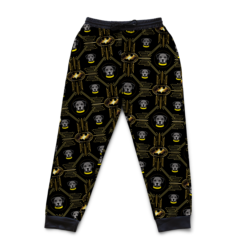 Black pajama pants with Batman logo pattern on a white background[IconicBatmanSweatpants]