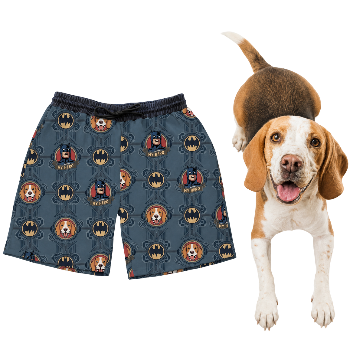 Dog shorts with superhero pattern next to a dog wearing a brown hat on a white background