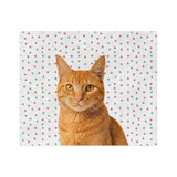 Custom fleece blanket with an orange tabby cat photo cutout portrait on a white background with red and green paw prints[ChristmasPawsImageCutOut]
