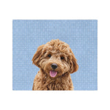 Custom fleece blanket with a curly goldendoodle photo cutout portrait on a light blue background with tiny white snowflakes[SnowflakesImageCutOut]
