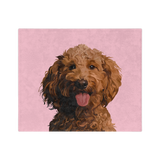 Pink blanket featuring a centered, smiling dog illustration.