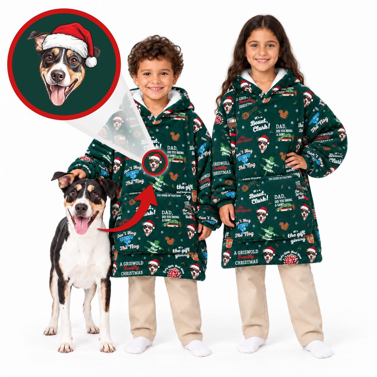 Two children and a dog wearing matching dark green Christmas-themed hooded blankets with a festive print, shown on a white background with a circular inset of a dog portrait wearing a Santa hat.