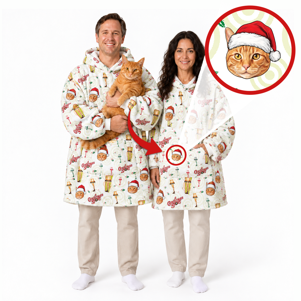 A man and a woman wearing matching holiday-themed hooded robes with a festive print, standing on a white studio background. The man holds an orange tabby cat, and there is a circular inset showing a close-up of the robe's print.