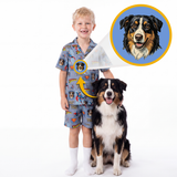 A child wearing a blue cartoon-print pajama set stands next to a dog, with a circular inset showing a dog portrait and an arrow pointing to the matching print. The product appears to be customizable pet apparel, shown on a person and dog against a clean white background.