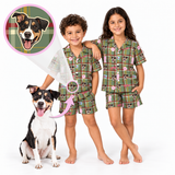 Two children wearing matching green plaid pajama sets with a dog print, standing barefoot on a white background next to a black and white dog. A circular inset shows a dog face over a green plaid pattern, with arrows pointing to the children's pajamas.